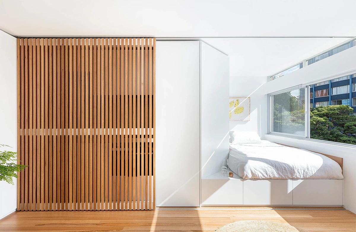 Interior Doors view of a slat door, allowing airflow and light while maintaining privacy.
