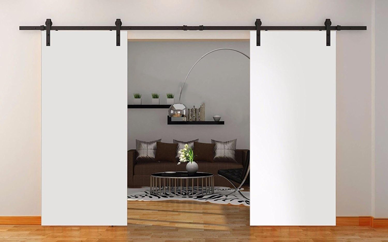 A sleek white barn door featuring matte black handles and rails, perfect for a minimalist home design.