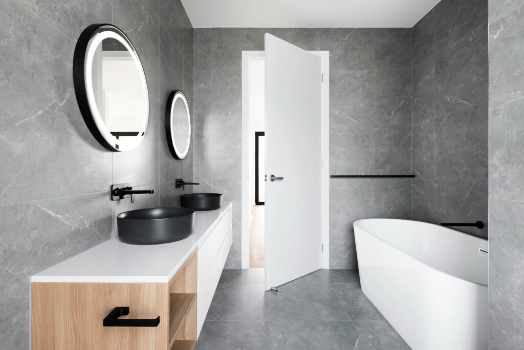 Interior shot showing a bathroom door with unique, decorative hardware.