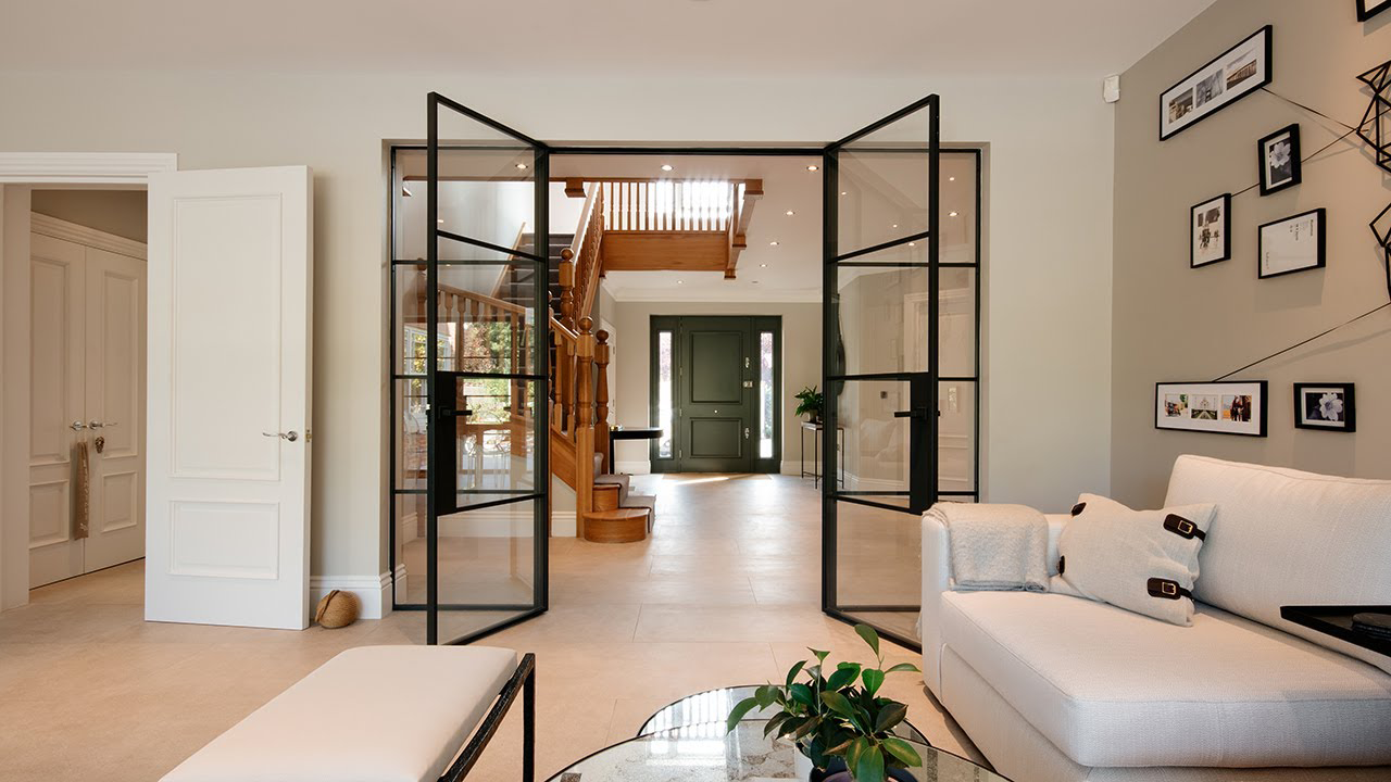 Double doors with intricate engraving, adding a unique touch to home decor.