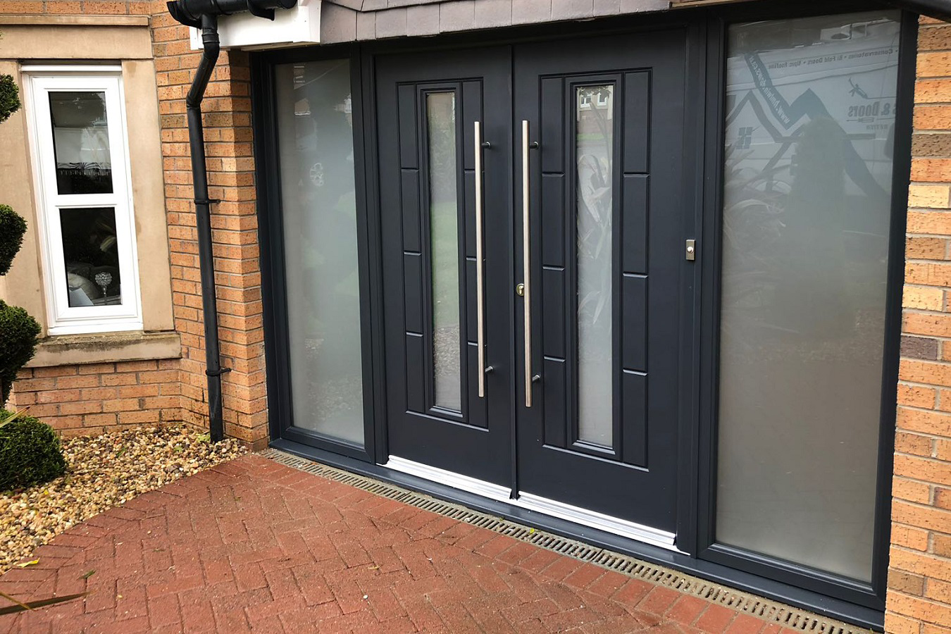 Double doors designed for improved accessibility and modern aesthetics.