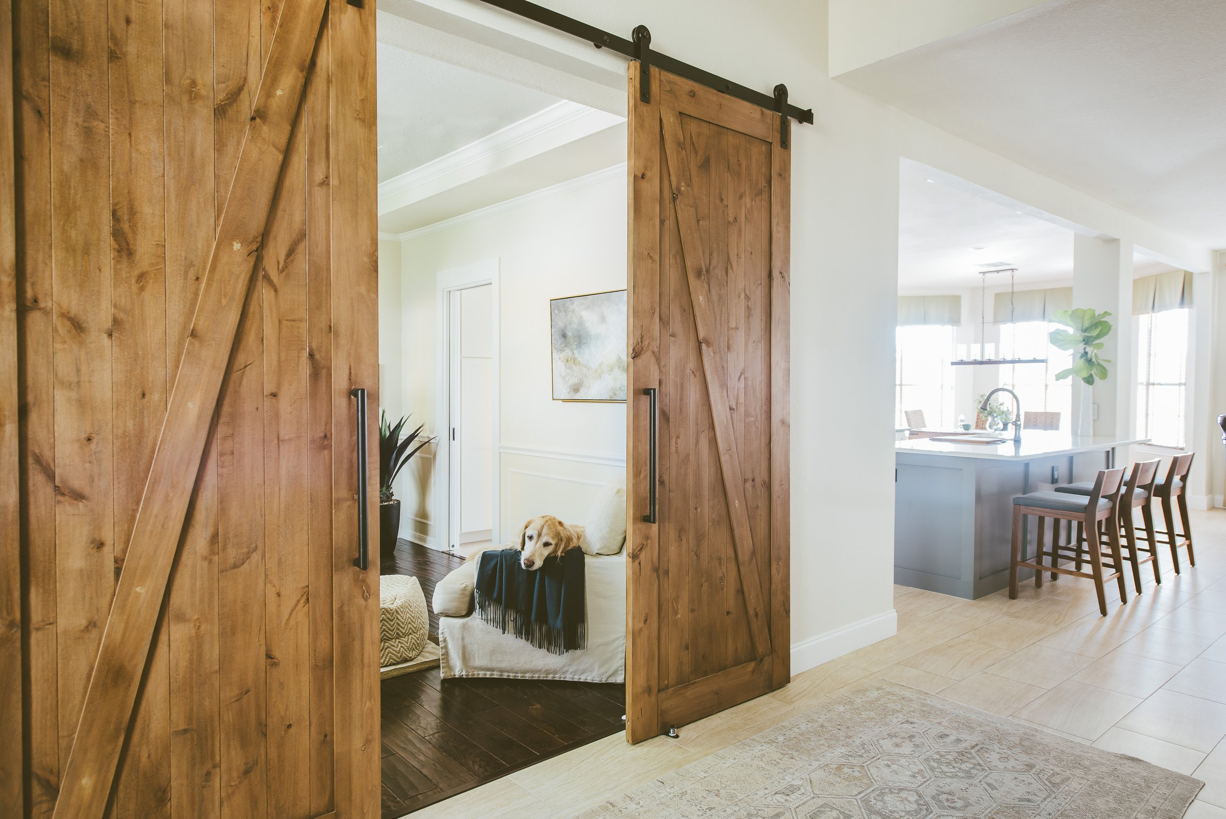 Frosted glass sliding door ensuring privacy while maintaining a bright and open feel.